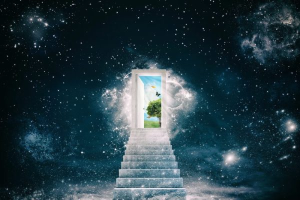A door at the top of a white stairway that opens into a magical land.